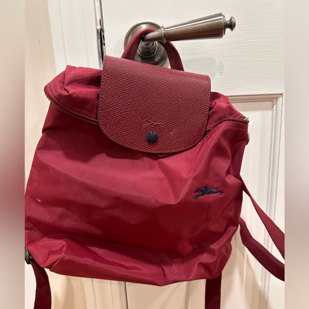 Longchamp Le Pliage mini canvas backpack in burgundy. Adorable bag!